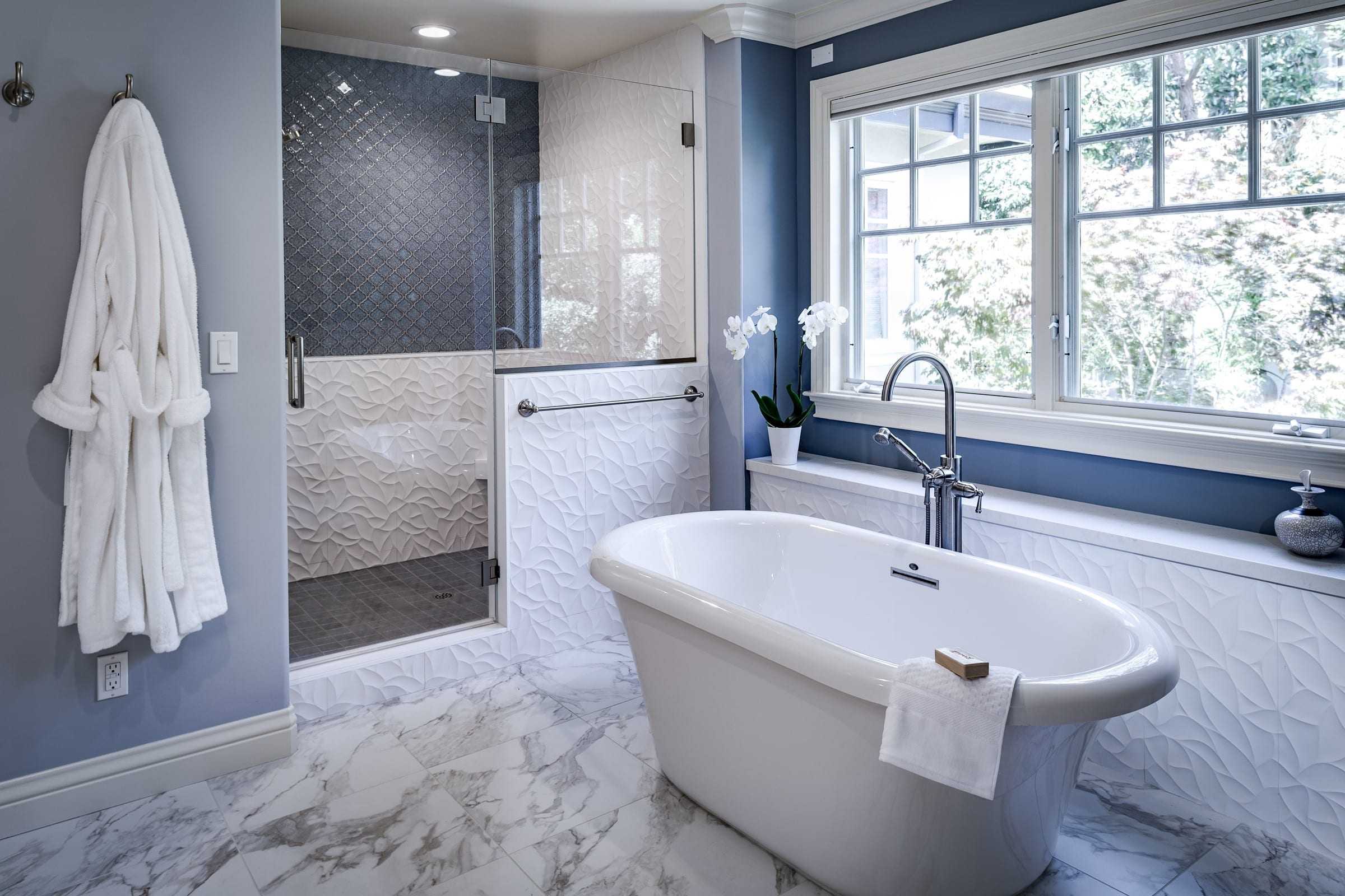 Bright and spacious bathroom with island seating and pendant lighting